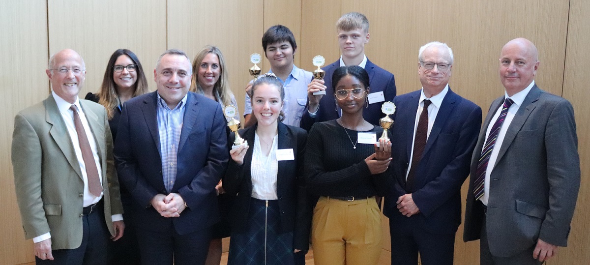 Photo of the Young Innovators winning team and judges