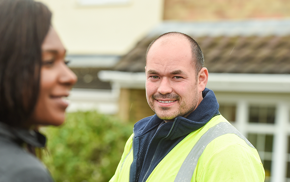 image of a customer with a customer liaison officer